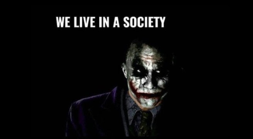 The Joker from DC Comic's Batman, with text above that reads: We live in a society