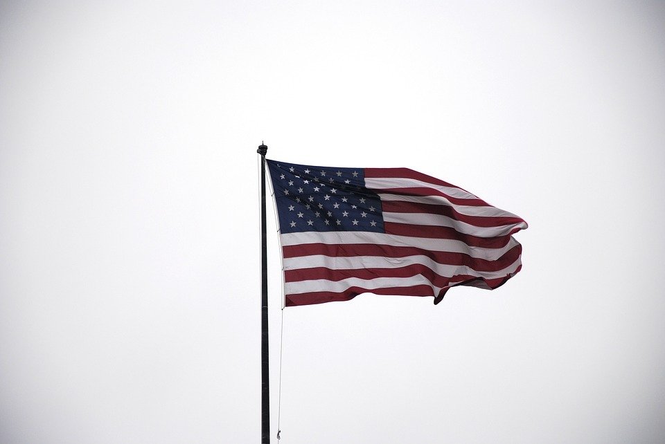 The American flag waving in the wind